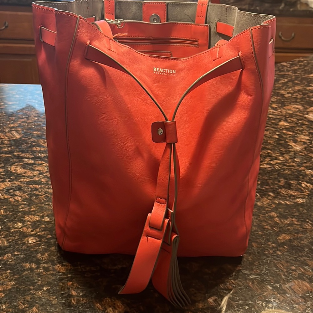 Reaction Kenneth Cole large pink/melon colored tote. EUC
